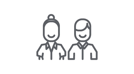 Male and female workers in uniform icon, demonstrating guest experience. 