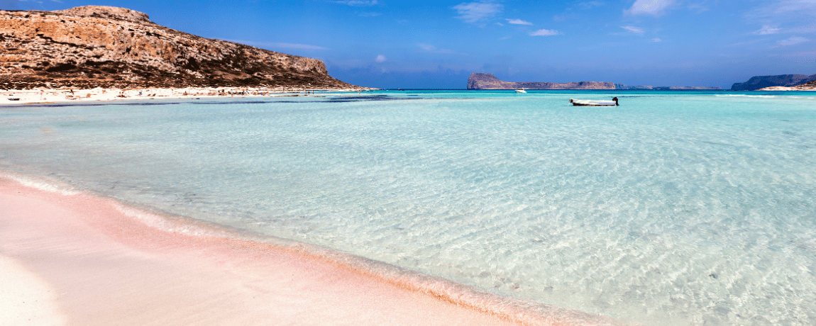 Sunny beach with crystal waters in Crete Greece